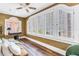 Bright sitting room with large windows offering ample natural light and city views at 1221 N Palm Ave # 303, Sarasota, FL 34236