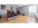 Cozy bedroom with hardwood floors, a comfortable bed, and a study area at 12214 Hernando Rd, North Port, FL 34287