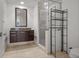 Bathroom with marble vanity, glass shower and updated fixtures; great natural light at 1350 Main St # 1703, Sarasota, FL 34236