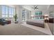 Bright bedroom with a king-size bed, large windows, and balcony access, offering stunning views at 1350 Main St # 1703, Sarasota, FL 34236