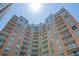 Low angle shot of a multi story building with balconies and many windows on a sunny day at 1350 Main St # 1703, Sarasota, FL 34236
