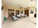 Spacious covered patio with seating area, perfect for entertaining guests or relaxing outdoors at 13809 18Th E Pl, Bradenton, FL 34212