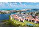 Aerial view of a waterfront community with bay and ocean views at 1608 Stickney Point Rd # 304, Sarasota, FL 34231