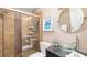 Nicely renovated bathroom featuring seamless glass shower, modern fixtures, and decorative accents at 1608 Stickney Point Rd # 304, Sarasota, FL 34231