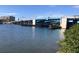 An exterior elevation shows the bridge that provides easy access to the beach and nearby condominiums at 1608 Stickney Point Rd # 304, Sarasota, FL 34231