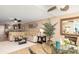 Open concept living room and kitchen area at 1608 Stickney Point Rd # 304, Sarasota, FL 34231