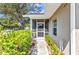 Inviting screened porch with a tiled floor, offering a relaxing outdoor living space at 1651 Red Oak Ln, Port Charlotte, FL 33948