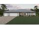 Charming single-story home boasting a three-car garage, lush green lawn and attractive stone accents at 17065 Kellog Ave, Port Charlotte, FL 33954