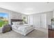 Serene main bedroom features plush carpet, natural light, and calming color scheme at 17065 Kellog Ave, Port Charlotte, FL 33954