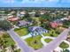 Expansive aerial view of a home, neighborhood, and landscaping showcasing curb appeal and prime location at 180 Lookout Point Dr, Osprey, FL 34229