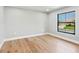 Empty bedroom with natural light and a view of the neighborhood at 180 Lookout Point Dr, Osprey, FL 34229