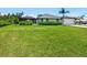 Beautiful single-Gathering home with well-manicured lawn and screened in porch at 180 Lookout Point Dr, Osprey, FL 34229