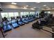 State-of-the-art gym equipped with treadmills and various exercise machines for a complete workout at 18109 Cropside Trl, Lakewood Ranch, FL 34211
