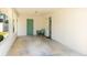 Covered carport area with access to the home's side entrance at 2110 Craft Ln, Sarasota, FL 34239