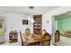 Dining room features a wooden table and chairs, with a hutch at 2110 Craft Ln, Sarasota, FL 34239