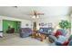 Bright living room with large windows and comfortable seating at 2110 Craft Ln, Sarasota, FL 34239
