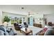 Spacious living room with a bay window, neutral carpet, and comfortable seating at 2110 Craft Ln, Sarasota, FL 34239