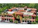 Aerial view of the community shops in a lovely neighborhood with palm trees at 2135 Hyde Park St, Sarasota, FL 34239