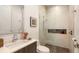 Modern bathroom featuring a glass door shower, sleek vanity, and tiled accents at 2135 Hyde Park St, Sarasota, FL 34239