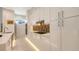 Modern kitchen with stainless steel appliances, ample storage, and stylish backsplash at 2135 Hyde Park St, Sarasota, FL 34239