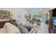 Living area with modern furnishings, bright light, and sliding glass doors leading to outdoor space at 2135 Hyde Park St, Sarasota, FL 34239