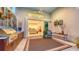 Outdoor space featuring an outdoor kitchen, lounge area, and smooth transition to the indoor living area at 2135 Hyde Park St, Sarasota, FL 34239