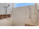 Close up on shower with double showerheads and mosaic tiling at 2135 Hyde Park St, Sarasota, FL 34239