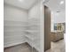 Pantry featuring wire shelving with an entrance to the kitchen at 2258 Margaret Ln, North Port, FL 34286