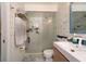 Modern bathroom with glass shower, white tiled walls, and elegant fixtures at 2715 36Th Avenue E Ter, Bradenton, FL 34208