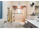 Well-maintained bathroom featuring tile flooring, updated fixtures, and a shower at 2715 36Th Avenue E Ter, Bradenton, FL 34208