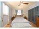 Cozy bedroom featuring hardwood floors, decorative wallpaper and natural light at 2715 36Th Avenue E Ter, Bradenton, FL 34208