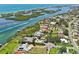 Stunning aerial shot showcasing the community's waterfront homes, canals, and boat access to the ocean at 321 Sorrento Dr, Osprey, FL 34229