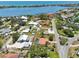 Aerial view of a neighborhood with tile roofs and a waterfront view at 321 Sorrento Dr, Osprey, FL 34229