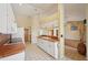 Kitchen featuring white appliances, terra cotta countertops, and views to the main living areas at 321 Sorrento Dr, Osprey, FL 34229