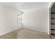Empty bedroom with light wood floors, white walls, a window, and a closet area for maximum storage at 3212 Ramblewood N Dr # 3212, Sarasota, FL 34237