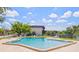 Enjoy a refreshing swim in the community pool with plenty of lounge chairs and lush landscaping at 3212 Ramblewood N Dr # 3212, Sarasota, FL 34237