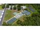 Aerial view of tennis and pickleball courts, pool and recreational facilities at 3707 Wild Blossom Pl, Parrish, FL 34219