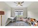 Bedroom with a window view and styled as a playroom at 3707 Wild Blossom Pl, Parrish, FL 34219