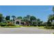 Gated community entrance features well-maintained landscaping and controlled access for residents at 4208 Balmoral Way, Sarasota, FL 34238