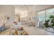 Open living area leading to the kitchen and sunroom, creating a seamless flow at 4208 Balmoral Way, Sarasota, FL 34238