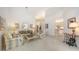 Spacious living room with natural light, neutral decor, and an open floor plan at 4208 Balmoral Way, Sarasota, FL 34238