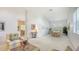 Open-concept living space showcases an adjacent dining area and plenty of natural light at 4208 Balmoral Way, Sarasota, FL 34238