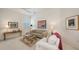 Inviting living room with neutral tones and ample natural light at 4208 Balmoral Way, Sarasota, FL 34238
