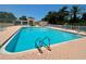 Large community pool with lounge seating and poolside amenities for residents to enjoy at 4208 Balmoral Way, Sarasota, FL 34238