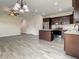Inviting living space showcasing an open floor plan that leads to a modern kitchen and breakfast bar at 4209 W Woodlawn Ave, Tampa, FL 33614