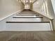 View of the staircase leading to the upper level of the home at 4209 W Woodlawn Ave, Tampa, FL 33614