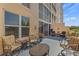 Large balcony featuring a seating area with a view of the building exterior at 4410 Fairways Blvd # 104, Bradenton, FL 34209