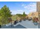 Relaxing balcony with outdoor furniture, offering a view of the green landscape and sky at 4410 Fairways Blvd # 104, Bradenton, FL 34209