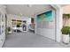 A building lobby features mailbox banks, a sitting bench and art, and an entrance at 4410 Fairways Blvd # 104, Bradenton, FL 34209