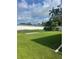 Large, well-kept backyard with a privacy fence, offering plenty of space for recreation at 48 Dade Ave, Sarasota, FL 34232